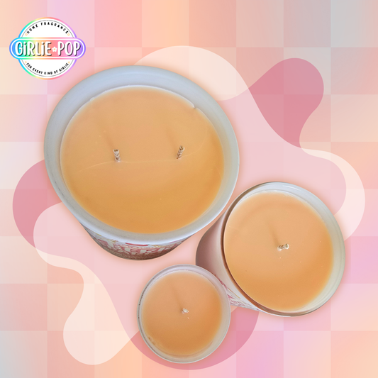 Berry Sparkling Flirty Girlie peach coloured candle with strawberry champagne fragrance by Girlie Pop, a handmade scented candle in Australia